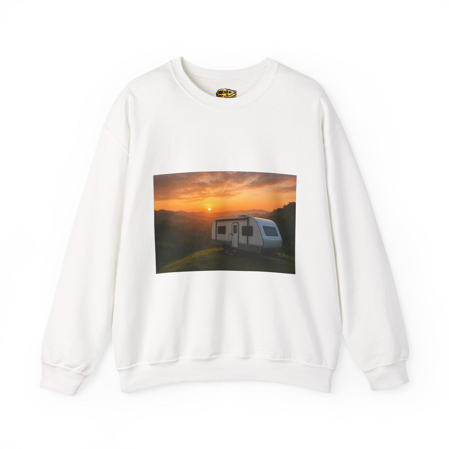 White sweatshirt with a printed design of a sunset over a field and a caravan.
